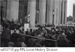 Speaker addressing crowd at Rundel Memorial building dedication.